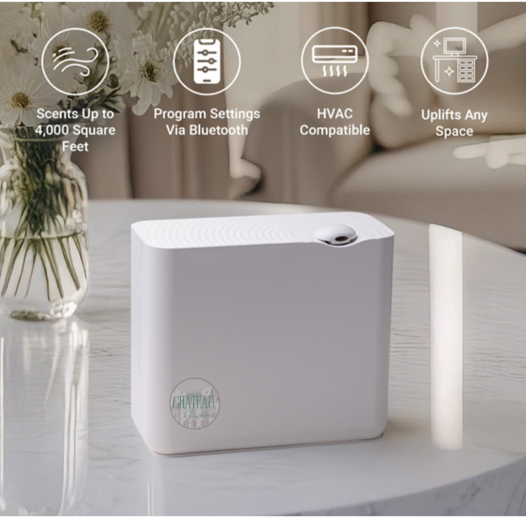 Chateau Grande Scent Diffuser in white finish on marble table – Bluetooth programmable, HVAC compatible, scents up to 4,000 sq ft by Chateau Essence